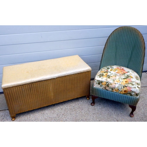 648 - A Lloyd Loom blanket box together with a nursing chair (2)