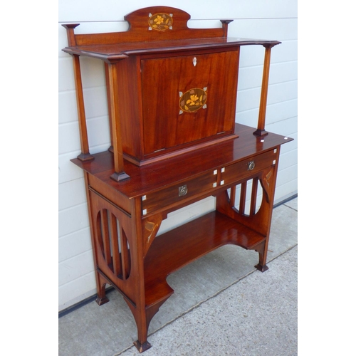 655 - An Arts & Crafts inlaid mahogany desk in the manner of Shapland & Petter
92cm wide, 43cm deep and 13... 