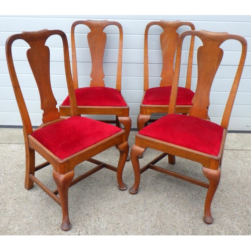 660 - A set of four oak Queen Anne style dining chairs