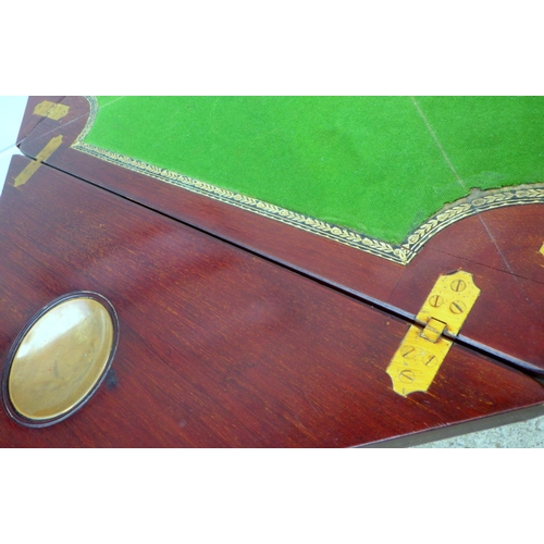 665 - A late Victorian mahogany inlaid envelope card table