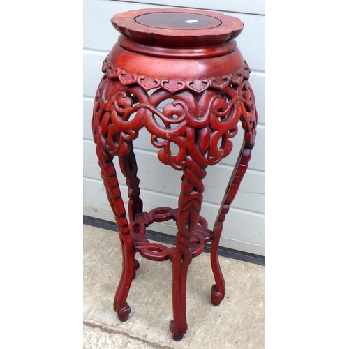 674 - A Oriental carved jardinere stand 68cm high