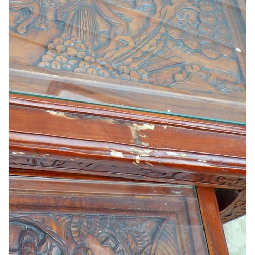 678 - An Oriental carved nest of three tables af