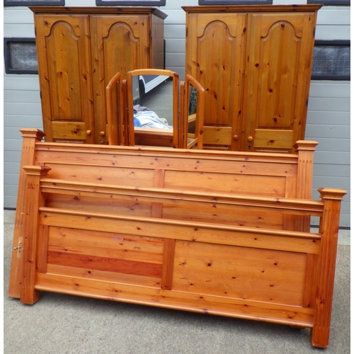 690 - A pair of Pine robes, dressing table and a superking size bed frame