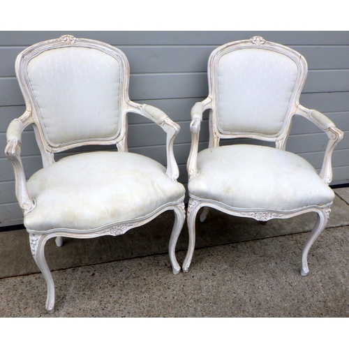 700 - A pair of French style arm chairs af