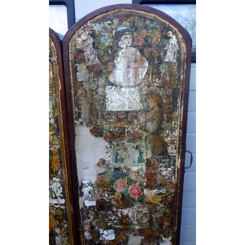 713 - A Victorian oak framed scrap screen af 163cm tall