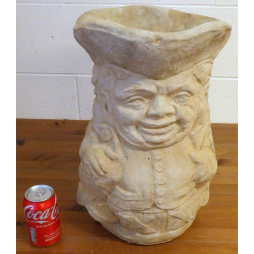 720 - A garden concrete Toby jug planter 43cm tall