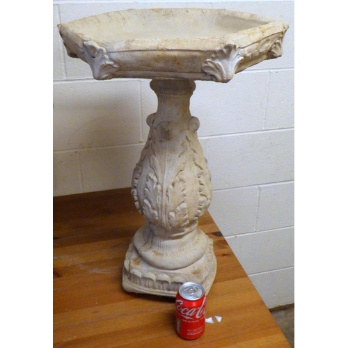 725 - A garden concrete bird bath 66cm tall