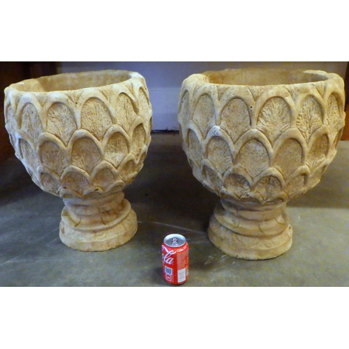 728 - A pair of garden concrete planters 48cm tall