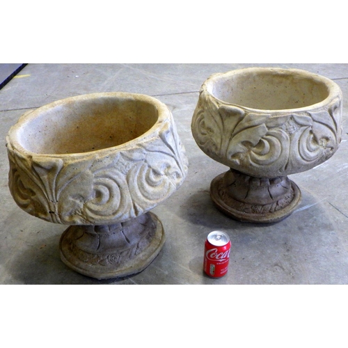 729 - A pair of garden concrete planters 40cm tall