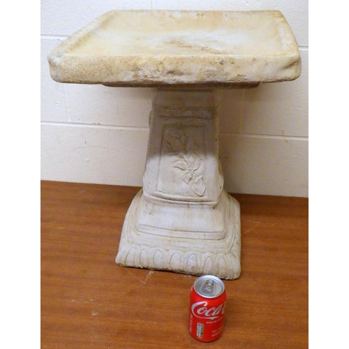 730 - A garden concrete bird bath 50cm tall together with a small bird bath (2)