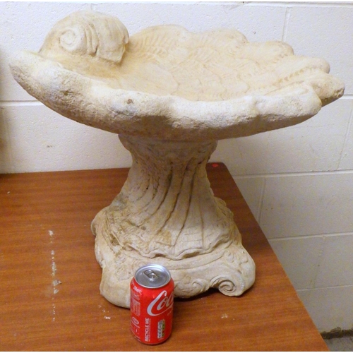 737 - A garden concrete clam shell bird bath 40cm tall