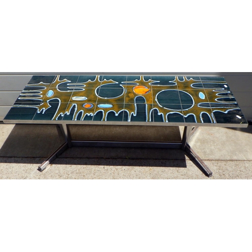 747 - A retro tiled top chrome coffee table 120 x 46cm