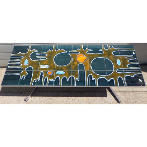 747 - A retro tiled top chrome coffee table 120 x 46cm