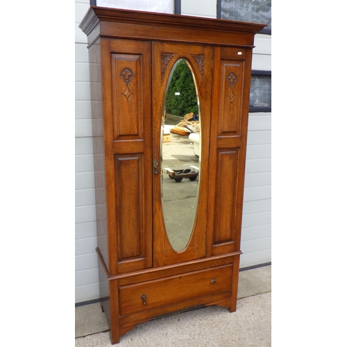 768 - A 1930s oak single door wardrobe 102cm wide, handle af & a modern side table (2)