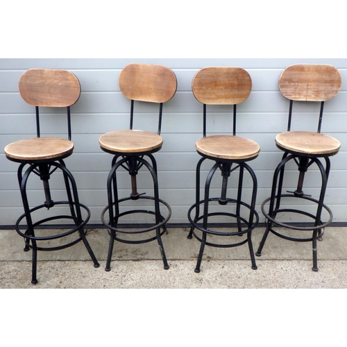770 - A Set of four swivel bar chairs