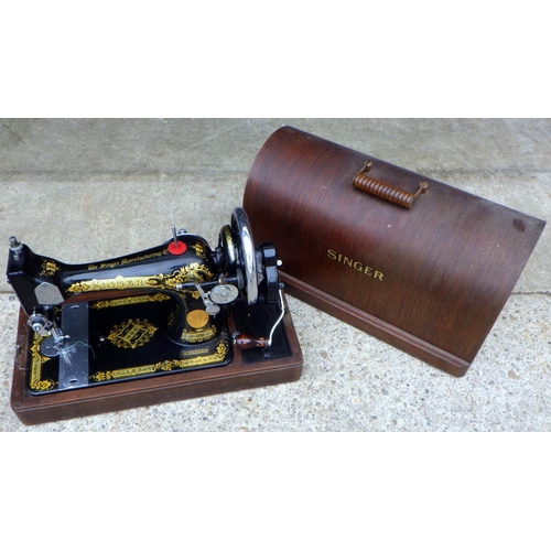 784 - A cased Singer sewing machine