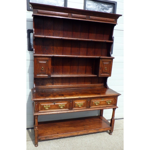 804 - An oak dresser 145 x 200cm