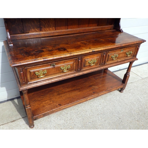 804 - An oak dresser 145 x 200cm