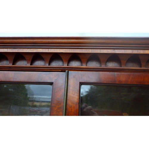 807 - A large Edwardian mahogany bookcase 140cm wide