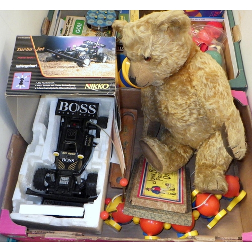180 - A collection of toys and games incl a jointed teddy bear. (2)