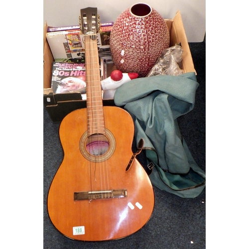 188 - An acoustic guitar, guitar interest books, a vase etc. (2)