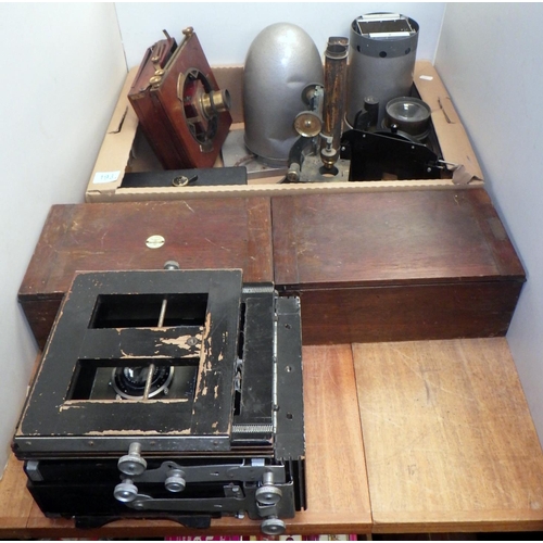 193 - A Sailsbury Tintometer, oak cased; two part microscopes; large format / plate  camera parts incl a Z... 