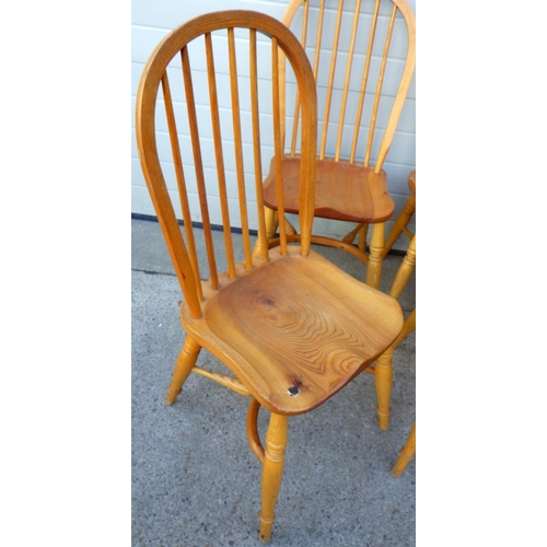836 - A set of six hoop back kitchen chairs