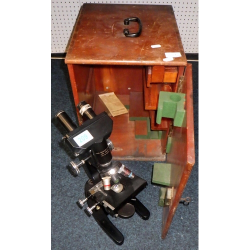 209 - A binocular microscope, Cooke Troughton & Simms, York.  Cased.