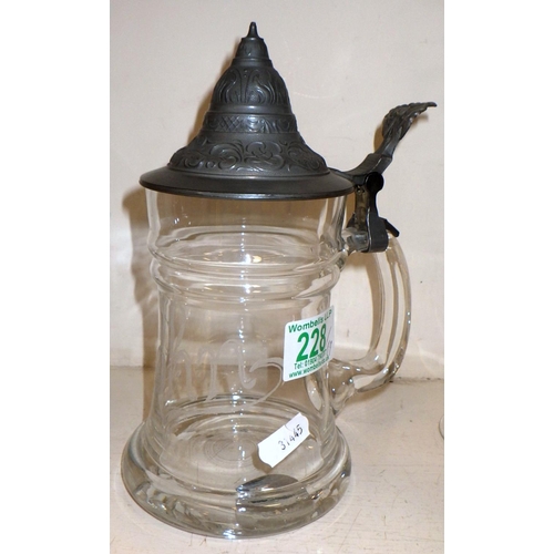 228 - A pewter covered glass tankard engraved 