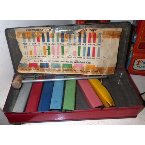 235 - A Mettoy tinplate toy range oven, other tinplate incl Sooty interest and toy chocolate dispensers.  ... 