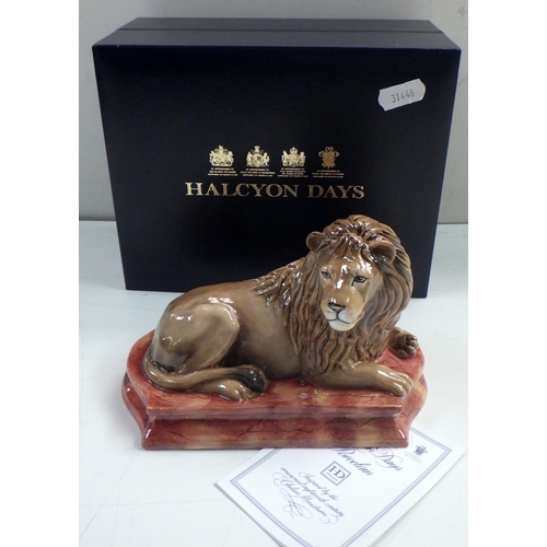 240 - A Halcyon Days Lion figurine, boxed.