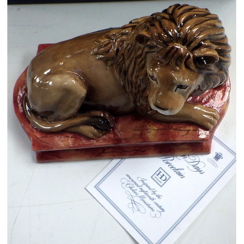 240 - A Halcyon Days Lion figurine, boxed.