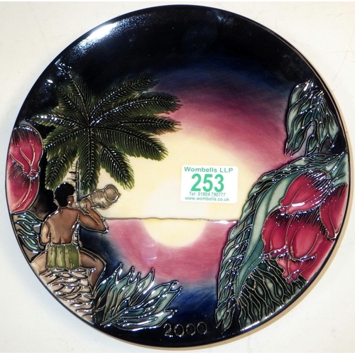 253 - A Moorcroft Pottery tropical beach motif plate, boxed.