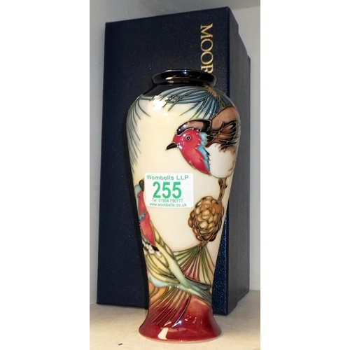 255 - A Moorcroft Pottery vase, the design depicting a robin and other birds, boxed.