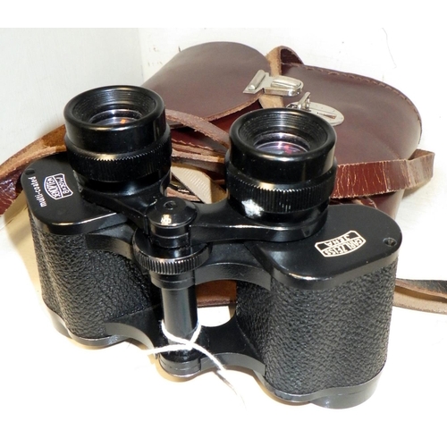 267 - A pair of Zeiss Jenoptem 8 x 30 binoculars, cased.