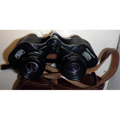 267 - A pair of Zeiss Jenoptem 8 x 30 binoculars, cased.