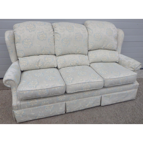 843 - A three seater floral settee 190cm long