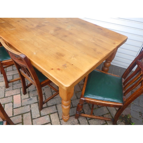 851 - A pine kitchen dining table153 x 90cm together with four 1930s oak chairs (5)