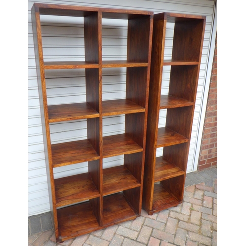 854 - Two modern hardwood shelves 122cm wide