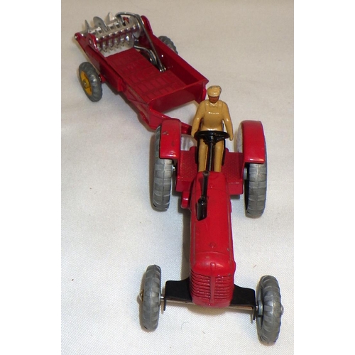 285 - Dinky Toys die-casts: a 300 Massey Harris Tractor, a 27c Manure Spreader, a 322 Disc Harrow, a 323 T... 