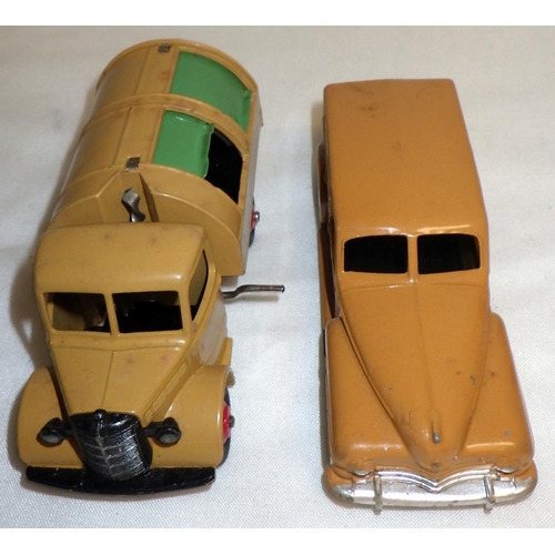 289 - Dinky Toys die-casts: a 252 Bedford Refuse Truck; a 344 Plymouth Estate Car. No boxes.