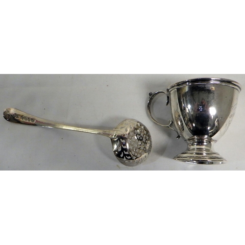 292 - Silver: sugar sifter spoon, IB London 1800; a hand mirror back; a hair brush; a christening mug 