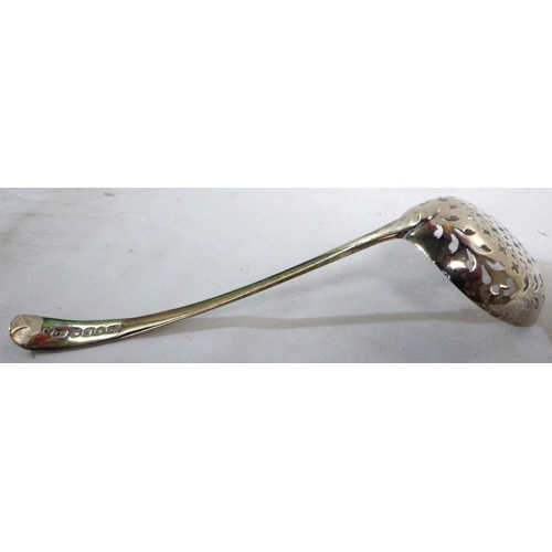 292 - Silver: sugar sifter spoon, IB London 1800; a hand mirror back; a hair brush; a christening mug 