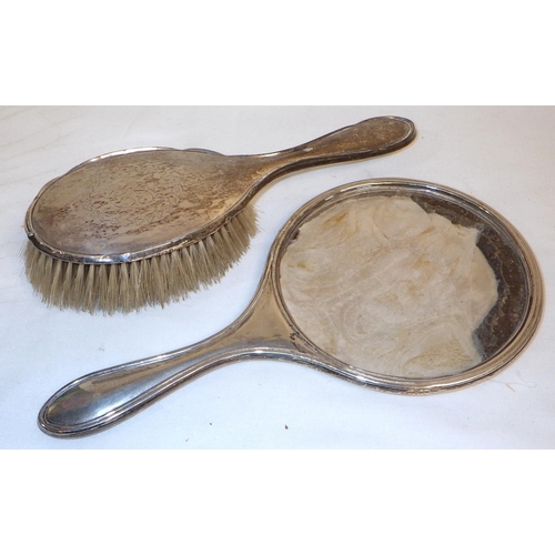 292 - Silver: sugar sifter spoon, IB London 1800; a hand mirror back; a hair brush; a christening mug 