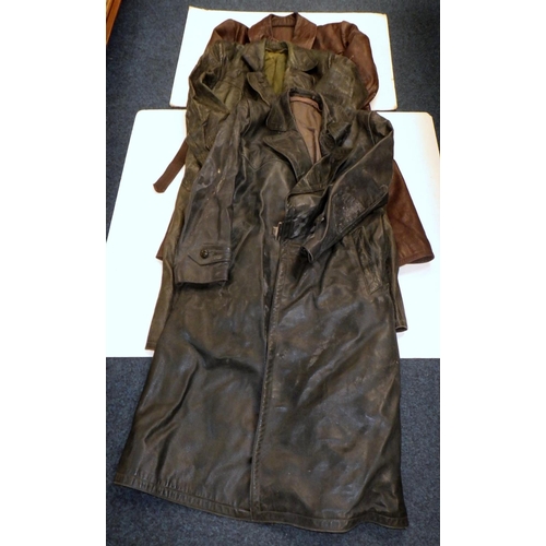 297 - A German grey / green leather greatcoat in WW2 German military manner, bearing a label 