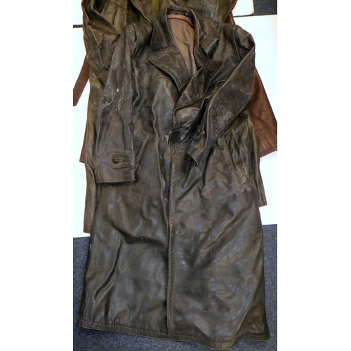 297 - A German grey / green leather greatcoat in WW2 German military manner, bearing a label 