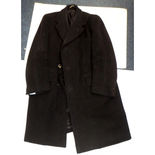 299 - A gentleman's Crombie black herringbone textured overcoat; a two piece dinner suit, both in early - ... 