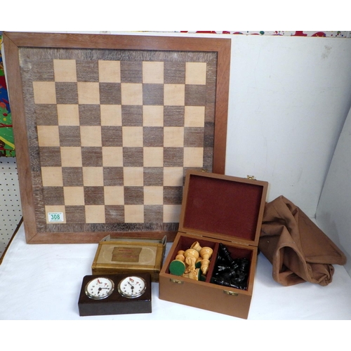 308 - A Staunton pattern weighted boxwood chess set, the kings 92mm tall; together with an inlaid wooden b... 