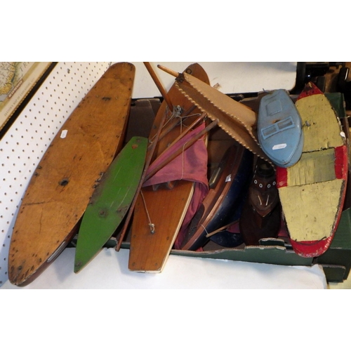 338 - Two wooden pond yacht hulls, other model and toy boats.  All a/f