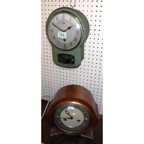 344 - A Smiths Enfield kitchen wall clock in a green painted steel case; a Smiths Enfield mantel clock.  (... 